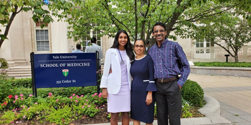 Former Classics Major Christina Jayaraj with her parents Maryrose Jayaraj and Edward Jayaraj in front of Yale Medical School, where Christina is a first year medical student.